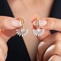 Zirkonstein SAN Ohrringe aus 925 Silber von AURIME, detailreiche silberne Ohrschmuck mit funkelnden Zirkonsteinen.
