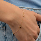 GLÄNZENDE KUGELN ARMKETTE | 14K GOLD