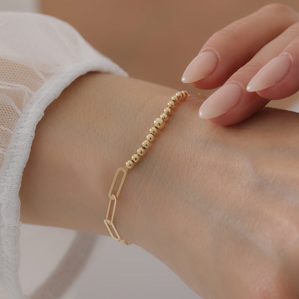SPIEGELKETTEN-BÜROKLAMMERN UND GLÄNZENDE REIHENKUGELN ARMKETTE | 14K GOLD