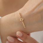 GLÄNZENDE REIHENKUGELN MIT KLEEBLATT-BLUMENMOTIV ARMKETTE | 14K GOLD