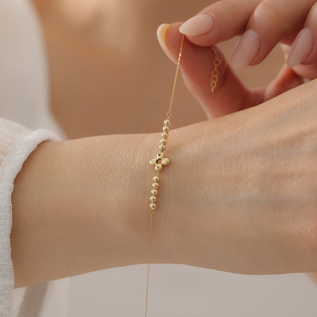 GLÄNZENDE REIHENKUGELN MIT KLEEBLATT-BLUMENMOTIV ARMKETTE | 14K GOLD