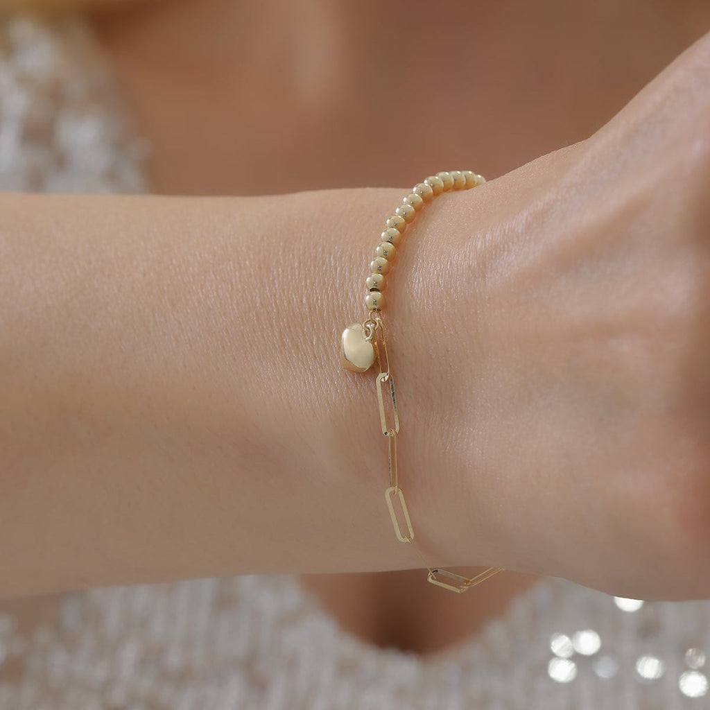 BÜROKLAMMER-, HERZ- UND GLÄNZENDES DORIKA-ARMBAND | 14K GOLD