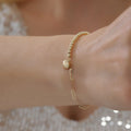 BÜROKLAMMER-, HERZ- UND GLÄNZENDES DORIKA-ARMBAND | 14K GOLD