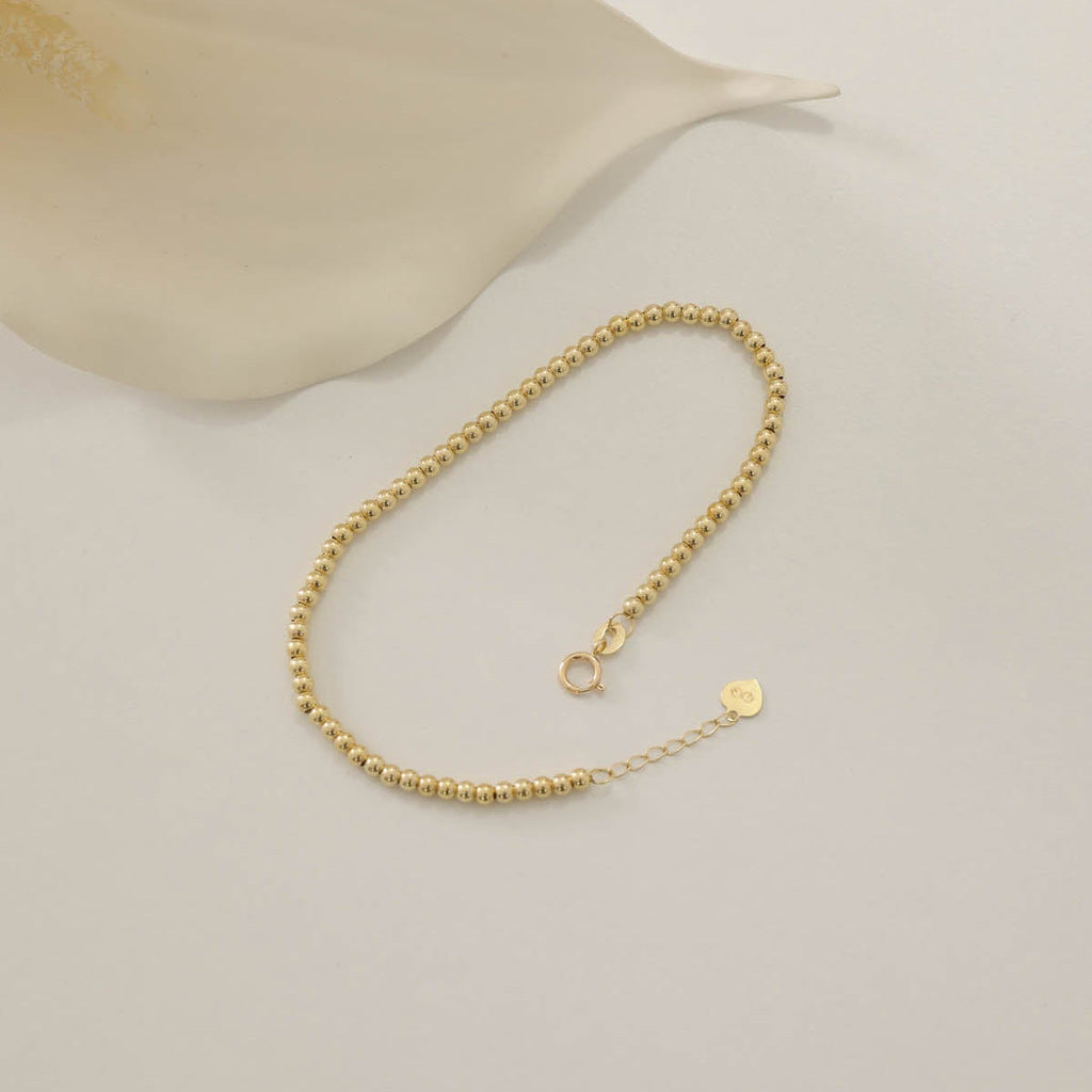 EINFACHES DORICA-KUGELDESIGN ARMKETTE | 14K GOLD