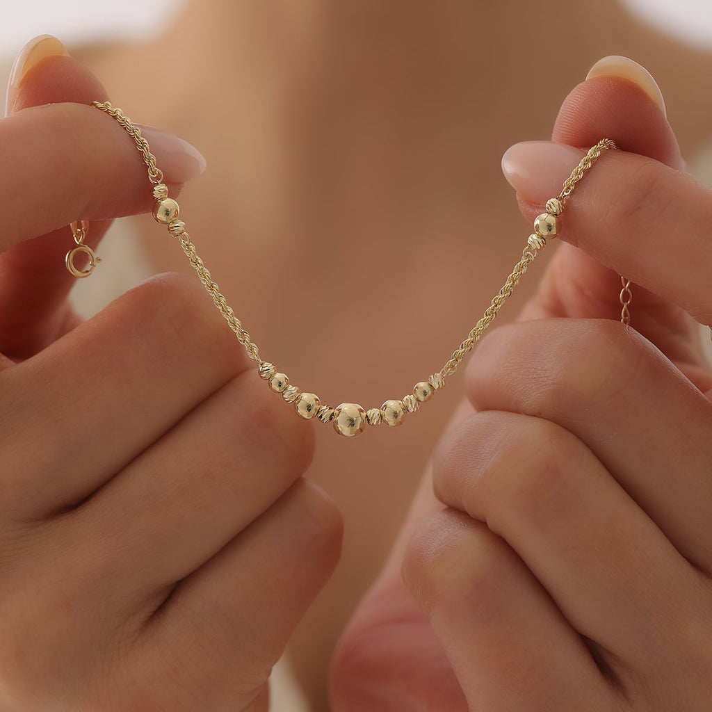 ARMBAND MIT DORIKA-KUGELN UND SEILKETTEN-DESIGN | 14K GOLD