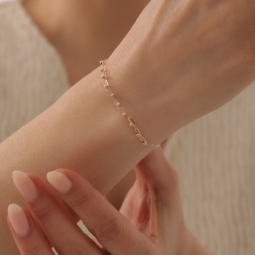 KLEINE BÜROKLAMMER MIT KUGELDETAIL ARMKETTE | 14K GOLD