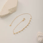 KLEINE BÜROKLAMMER MIT KUGELDETAIL ARMKETTE | 14K GOLD