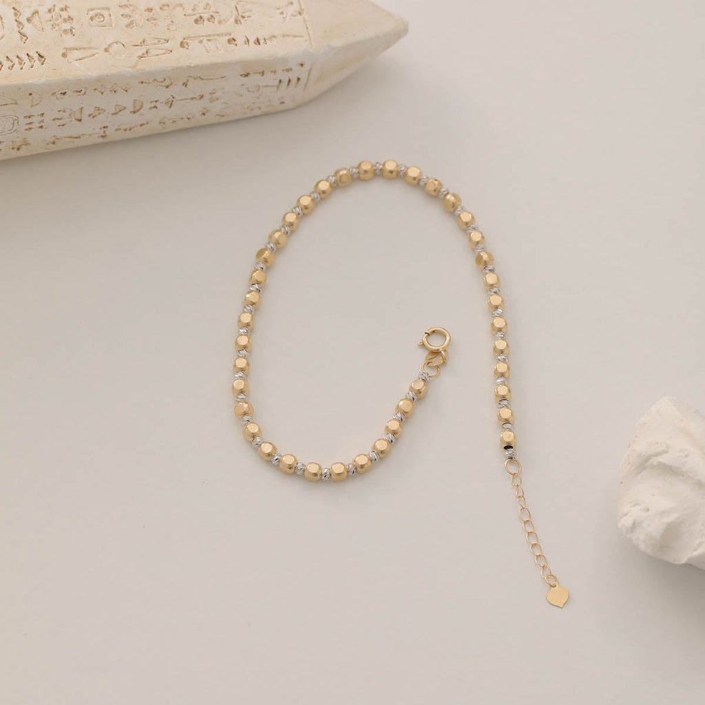 DORICA-KUGEL-REIHENOHRRINGE ARMKETTE | 14K GOLD