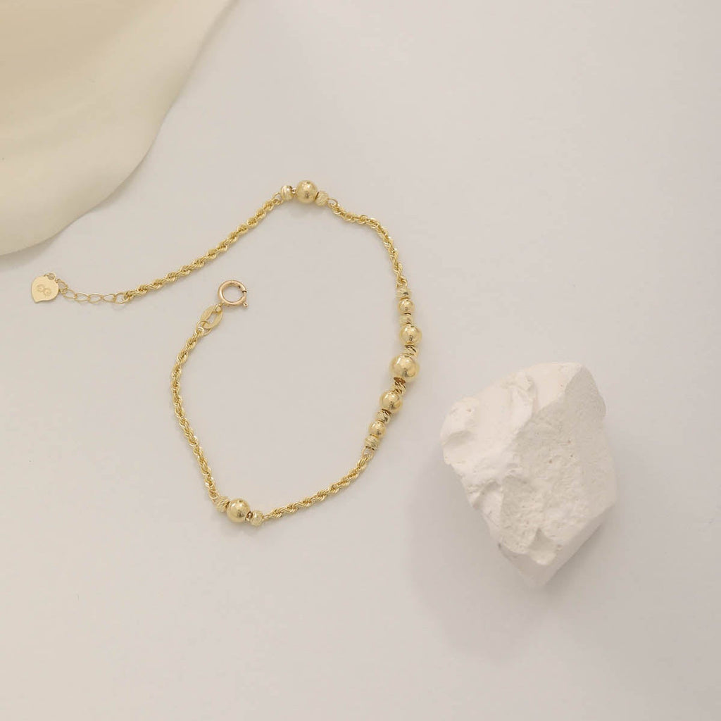 ARMBAND MIT DORIKA-KUGELN UND SEILKETTEN-DESIGN | 14K GOLD