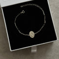 Silberarmband von AURIME, 925 Sterling Silber, elegante Damenarmkette mit filigranem Design, auf weißem Hintergrund fotografiert