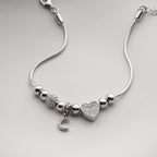 SICHELMOND MIT HERZ-CHARM ARMKETTE | 925 SILBER