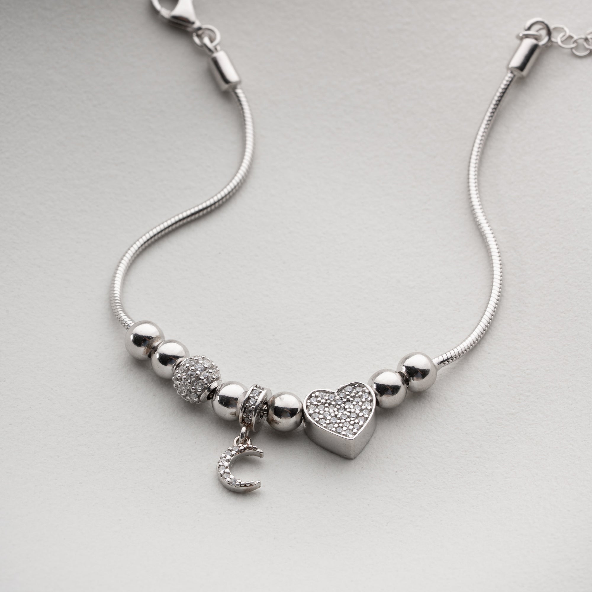 SICHELMOND MIT HERZ-CHARM ARMKETTE | 925 SILBER