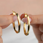 OVALE SPIRALE GOLD OHRRINGE | 925 SILBER