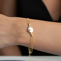 Silbernes Armband von AURIME, ROZAL, aus 925er Silber, fein gearbeitet und elegant auf einem weißen Hintergrund.