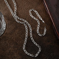 Silbernes Cuban Link Set aus 925er Silber von AURIME, detailreiche Kettenglieder, elegantes Design, Nahaufnahme.