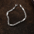 Flaches 5mm Silberarmband von AURIME, hochwertiges 925er Silber, elegantes Schmuckstück mit detaillierter Oberflächenstruktur
