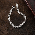 Äußeres Bild des flachen 6mm KÖNIGSARMBAND aus 925 Silber von AURIME, detailreiche Nahaufnahme des silbernen Armbands