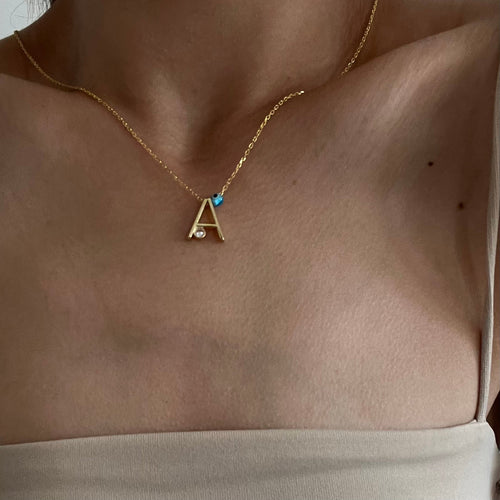 Silberne Buchstabenkette mit Nazareäugchen, AURIME, 925 Silber, detailreiche Kette mit Anhänger und Nazaräugendesign